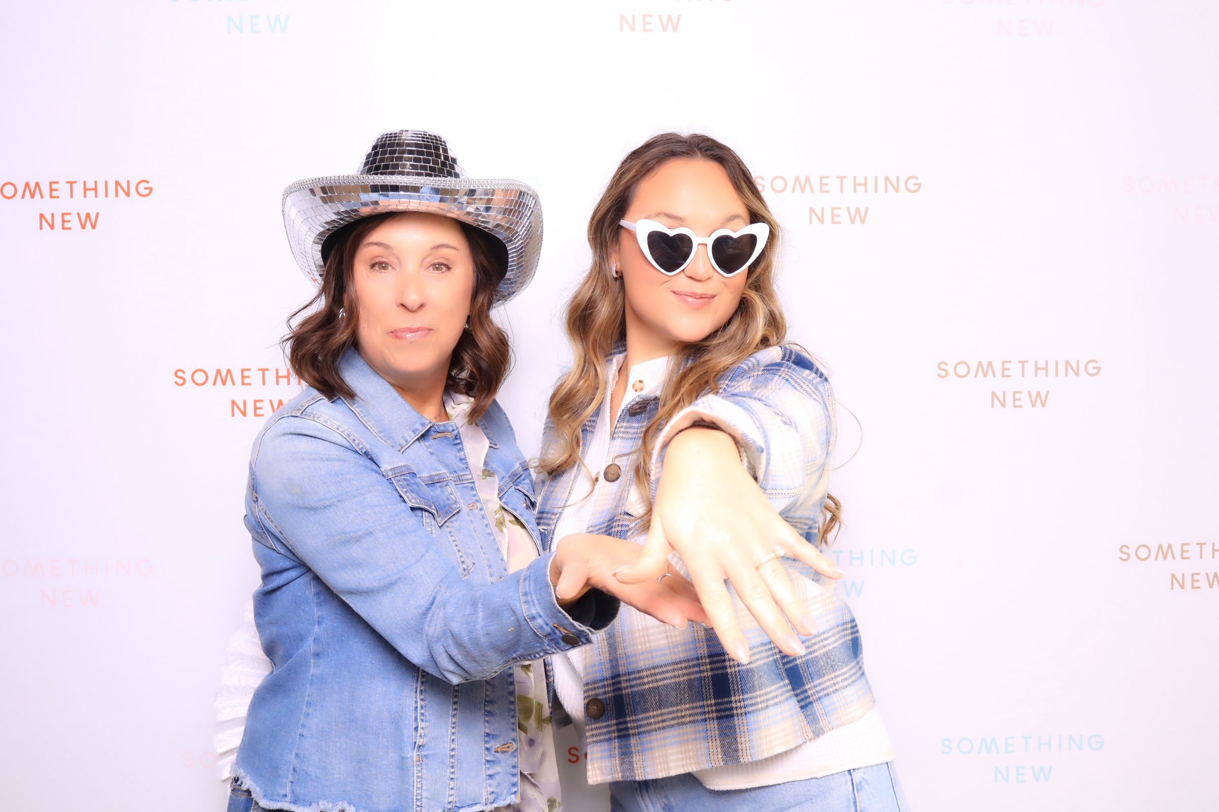 Bride posing at Martini Moment Photo Booth during Something New Boutique weekend in Colorado Springs
