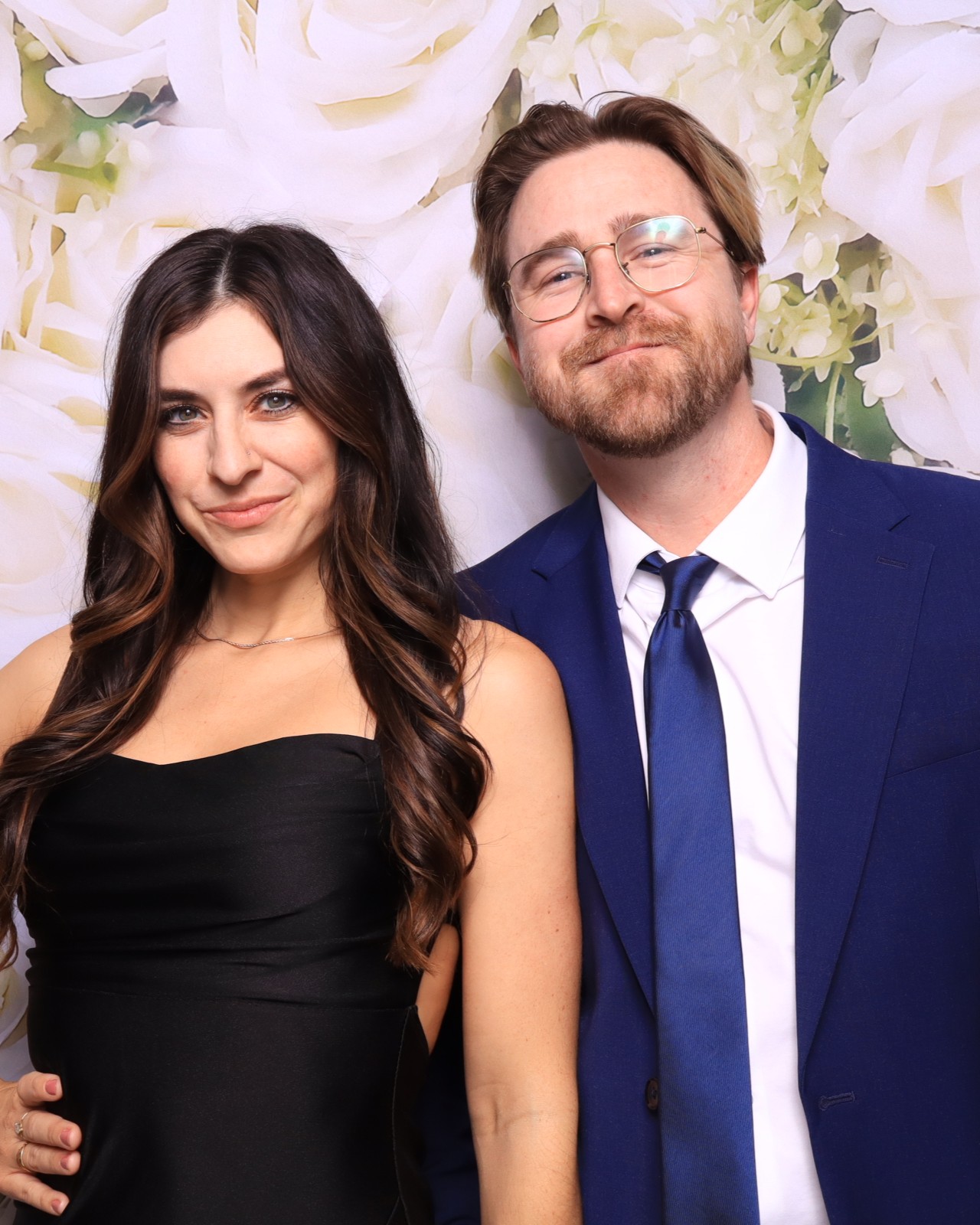 Couple taking photo booth pictures in an upscale wedding at The Pinery at the Hill