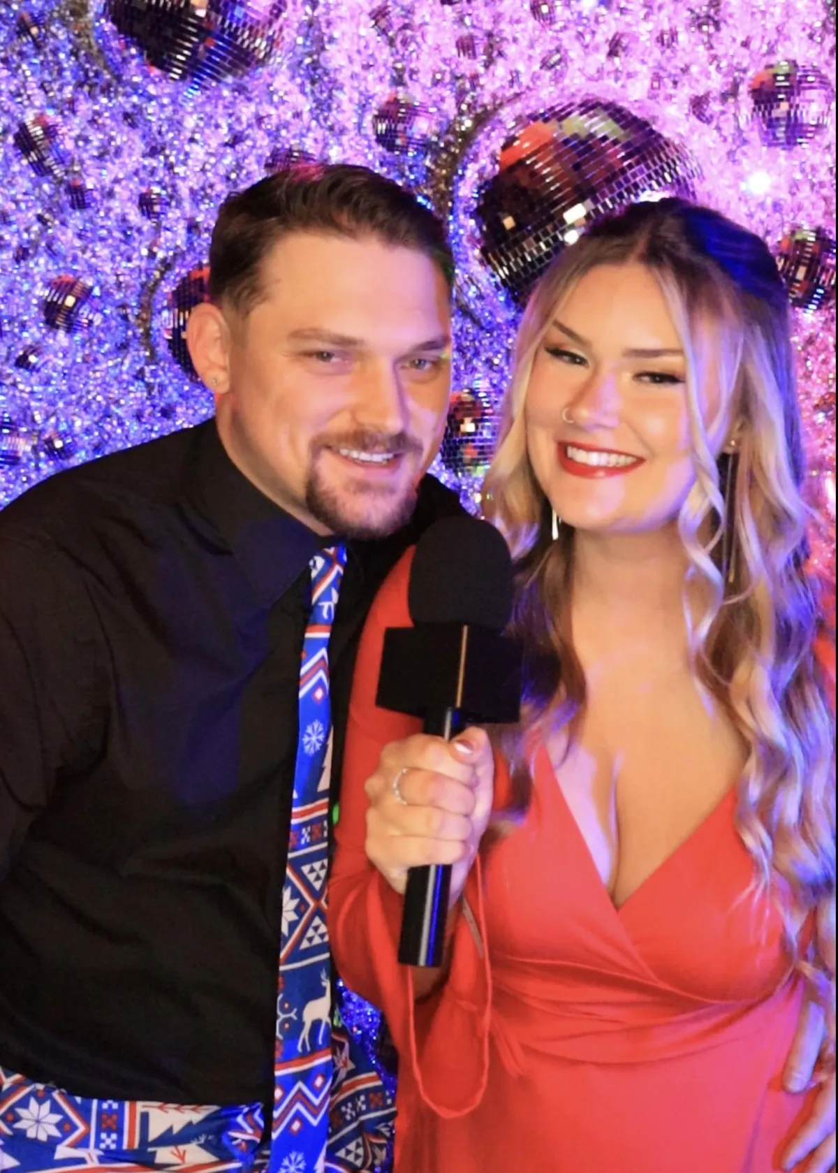 Wedding guests at elegant wedding in Colorado Springs in martini moment's video guest booth