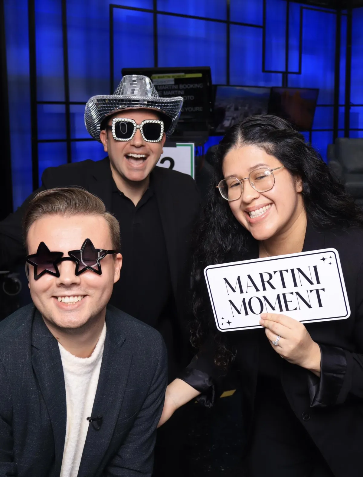 Something New Boutique stylists posing in Martini Moment Photo Booths in colorado springs
