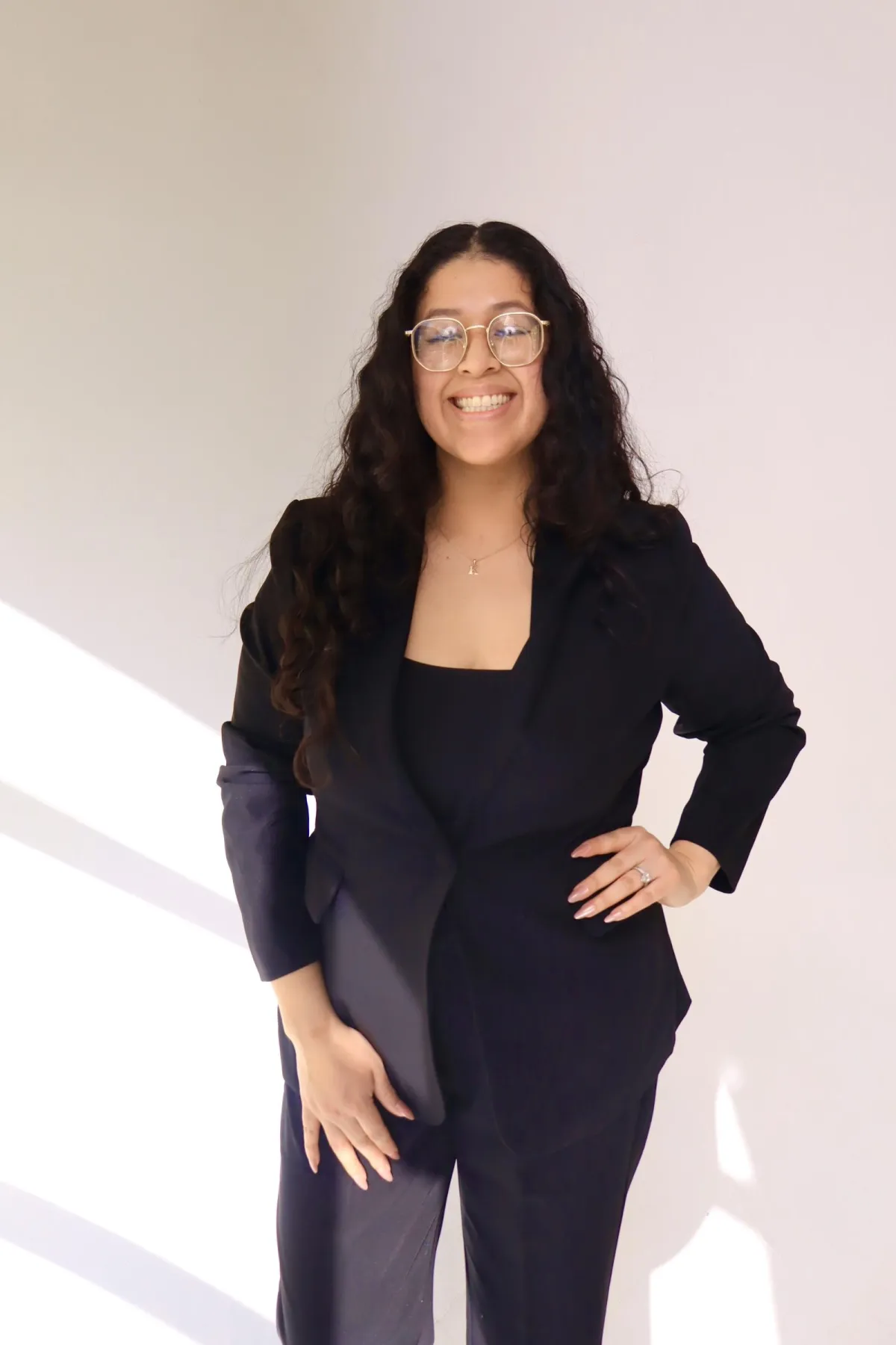 Karla, founder of Martini Moment Photo Booths, smiling while sharing her passion for capturing unforgettable wedding and event memories