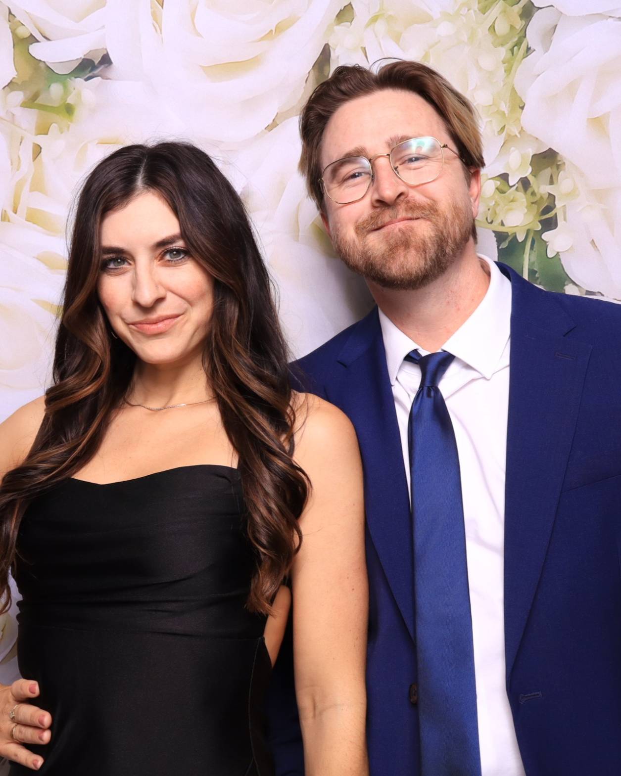 Couple taking photo booth pictures in an upscale wedding at phantom canyon in downtown colorado springs