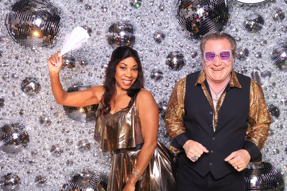 Guests posing at Gala Not Gala in Colorado Springs with Martini Moment Photo Booth setup