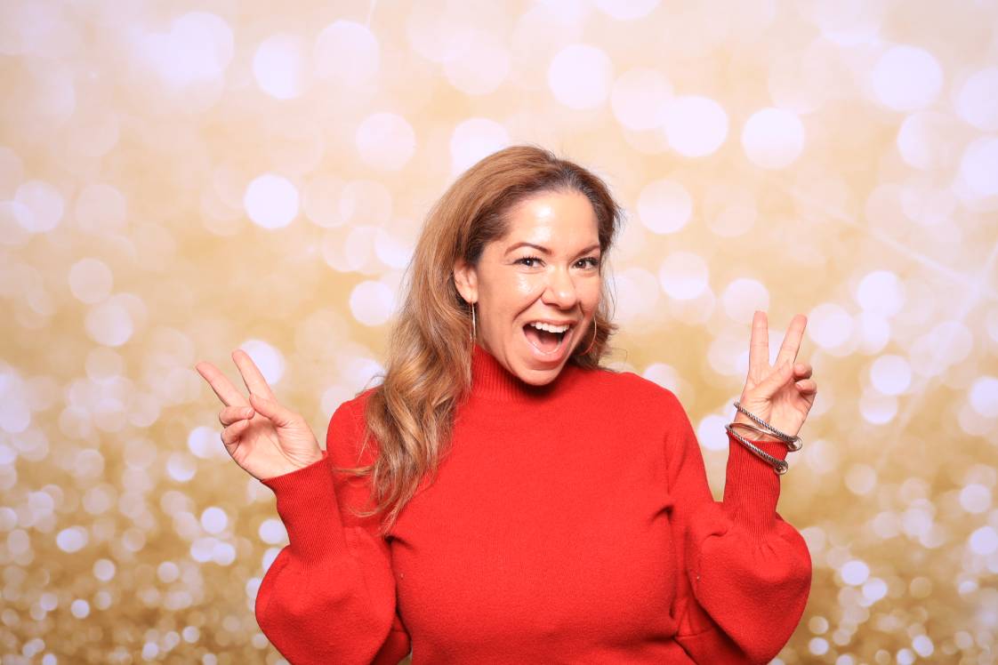 Guest posing in a luxury photo booth at Colorado Spring's Meanwhile Block