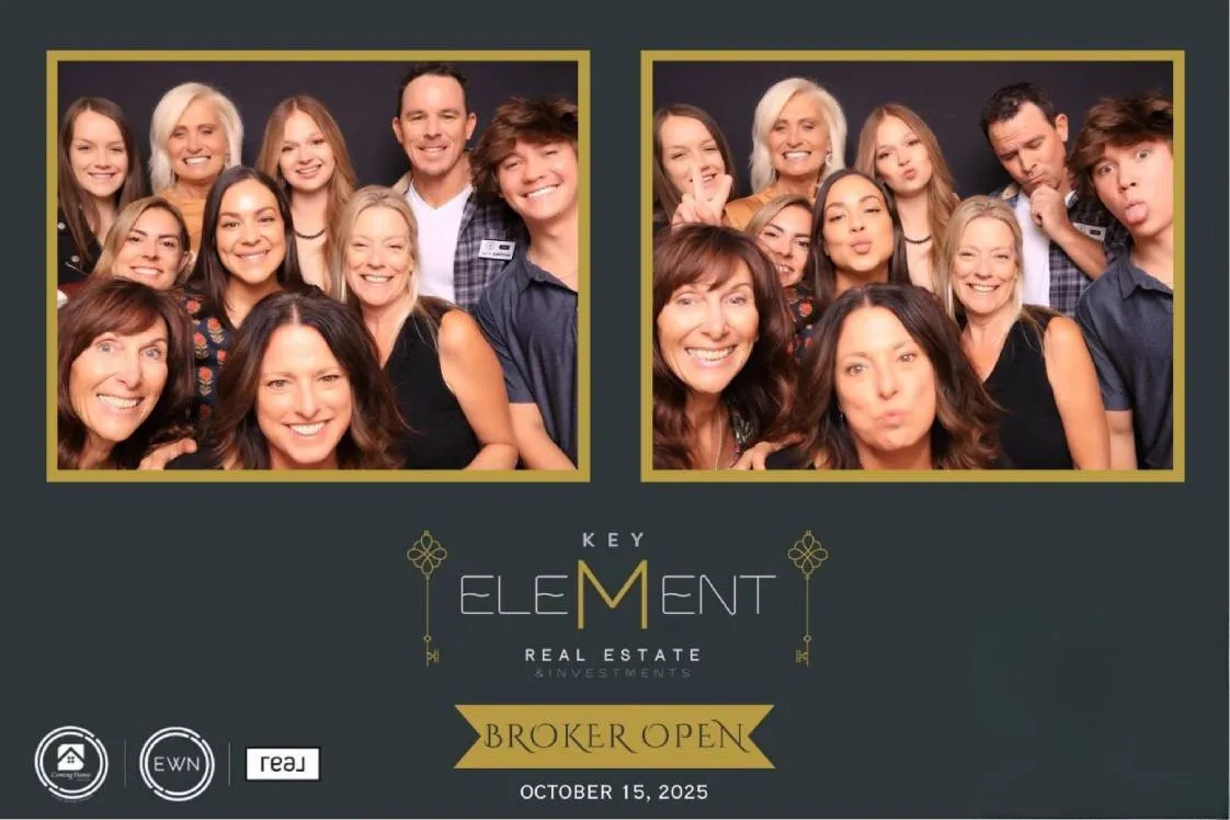 Guests posing with fun props in an elegant photo booth in Colorado Springs