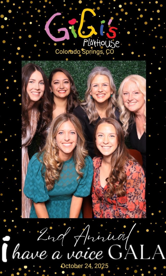Guest posing in a luxury photo booth at Colorado Spring's Meanwhile Block