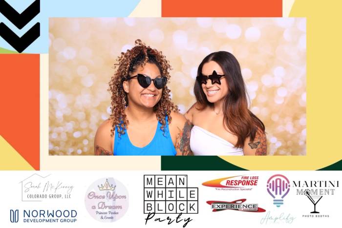 Friends using martini moment photo booths at meanwhile block in colorado springs