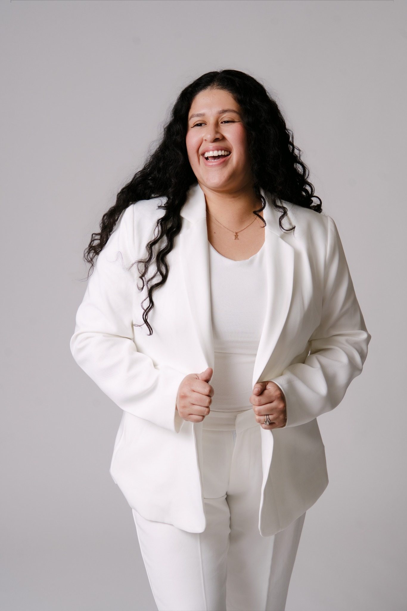 Karla, founder of Martini Moment Photo Booths, smiling while sharing her passion for capturing unforgettable wedding and event memories