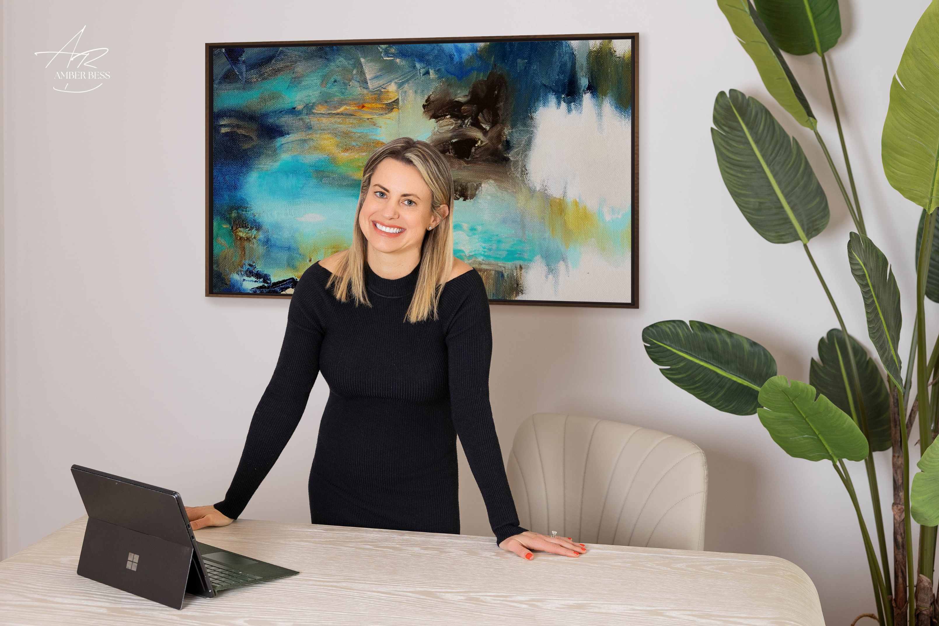 Amber Bess, trusted real estate agent in Omaha, Nebraska, helping clients buy and sell homes.