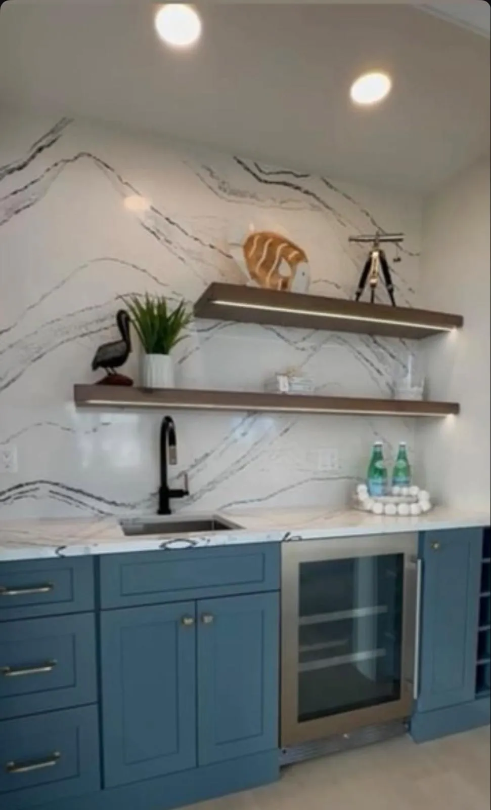 Custom architectural carpentry and built-in library wall with fine joinery