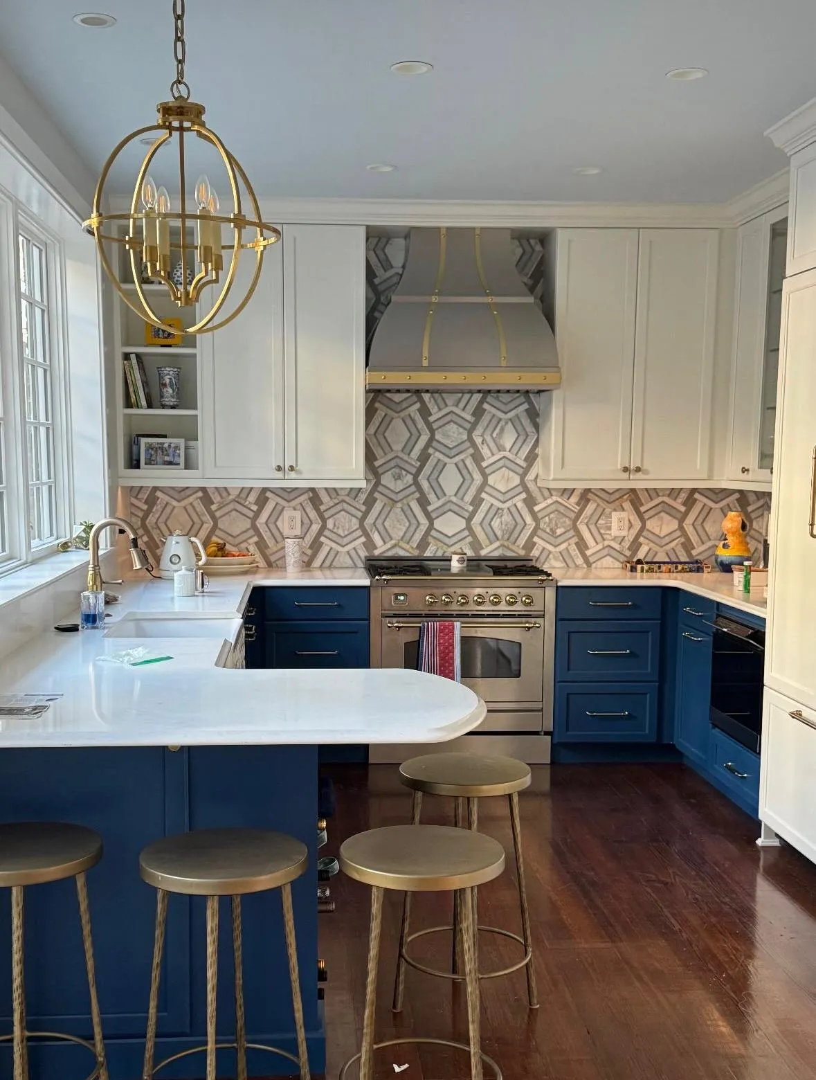 Luxury bespoke kitchen remodel with custom island and integrated cabinetry