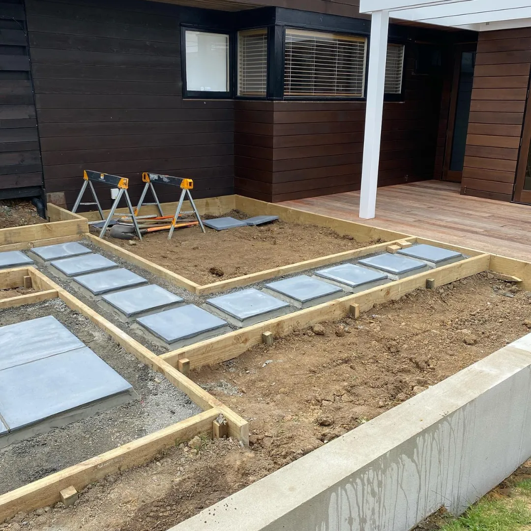 Outdoor living area upgrade with seating and planter boxes