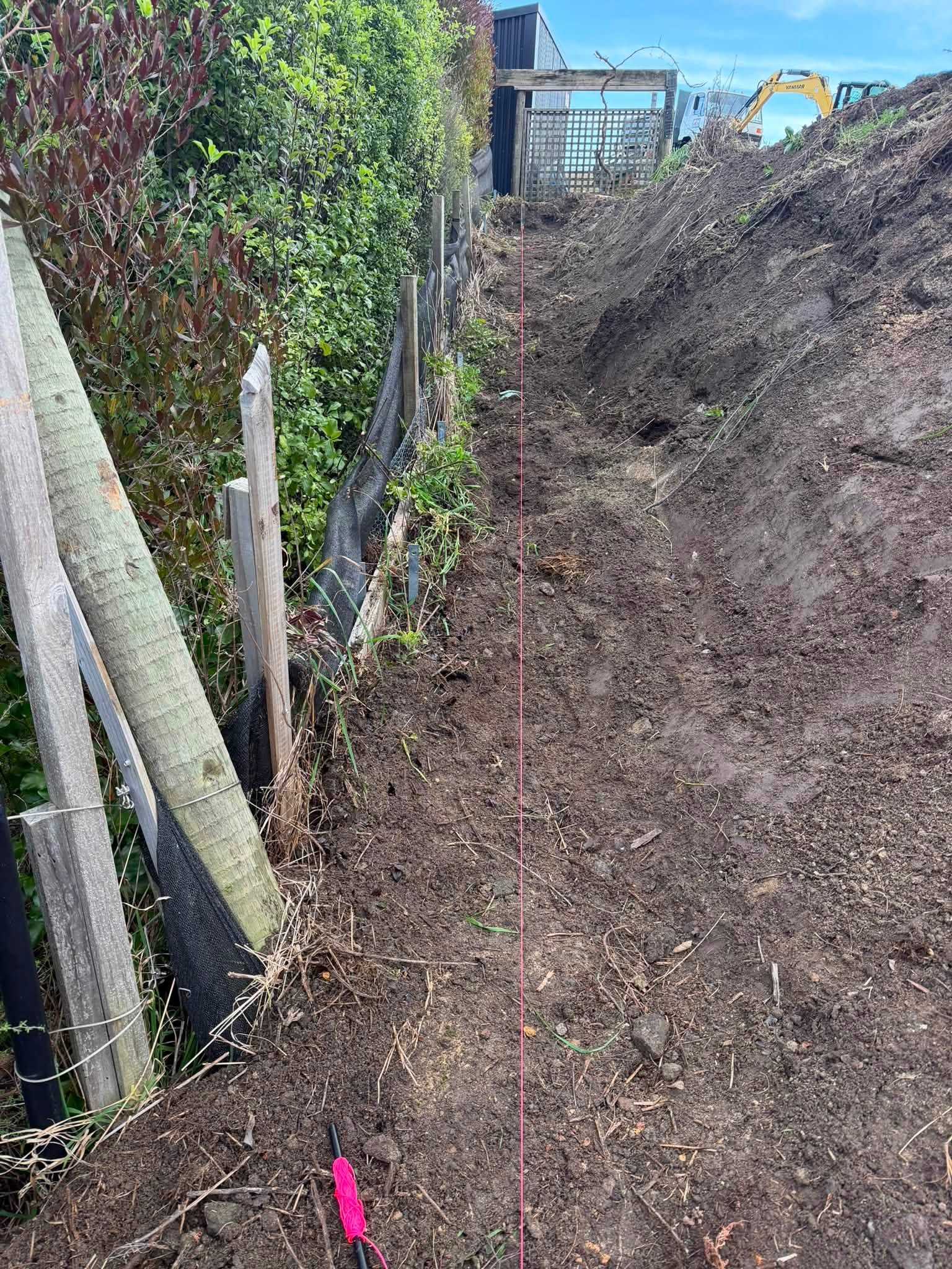 Retaining wall excavation on sloping section Tasman