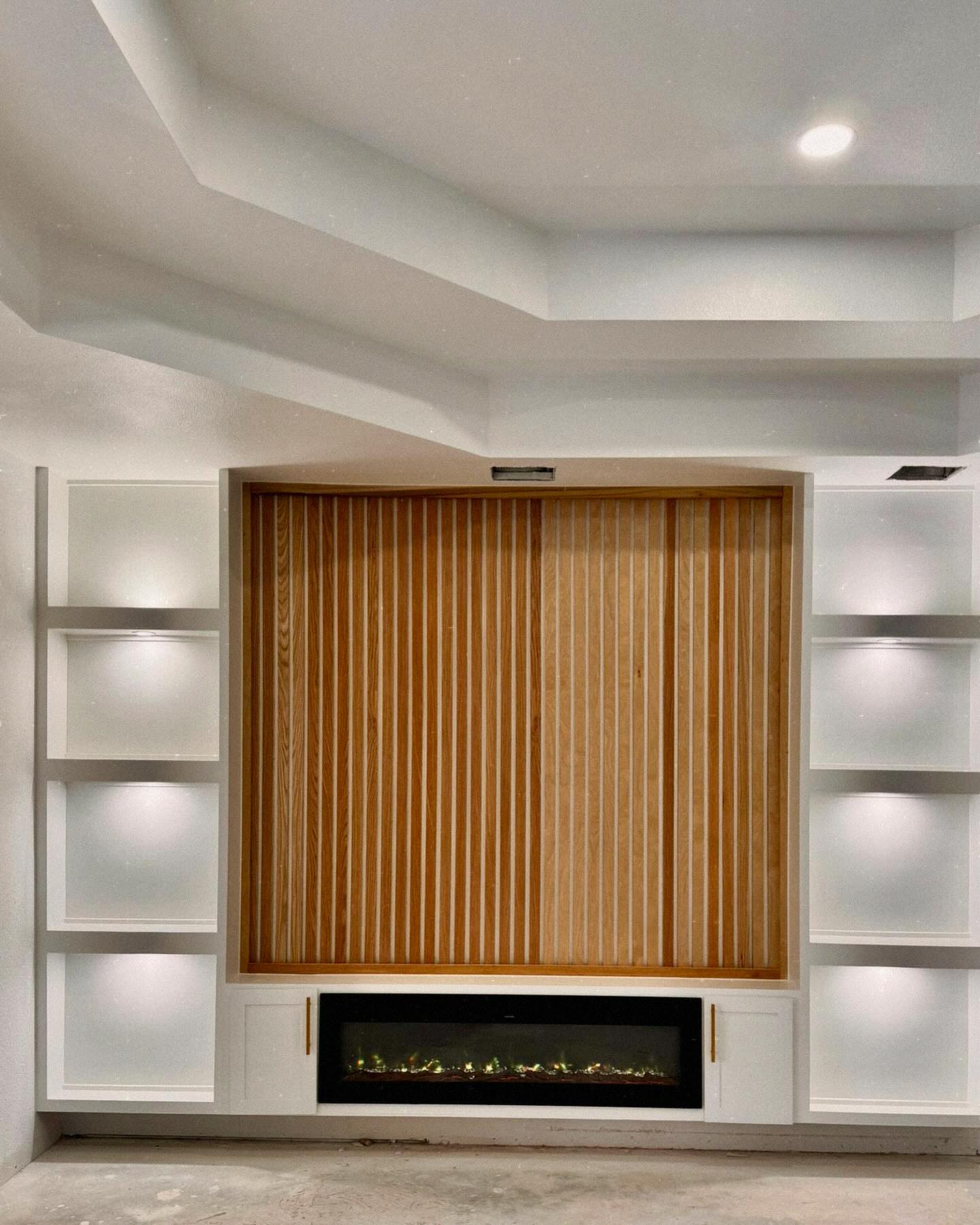 Backyard with circular paver patio, seating wall, and fire pit designed by Mundo Landscaping in Tucson, AZ — example of expert hardscape craftsmanship.