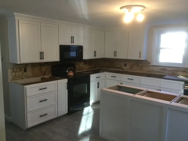Cabinet Refacing vs. Painting: What Actually Changes?
