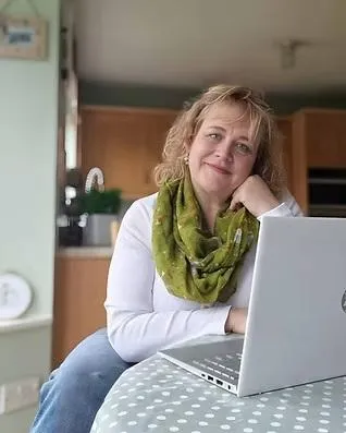 Nichola Working at the kitchen table