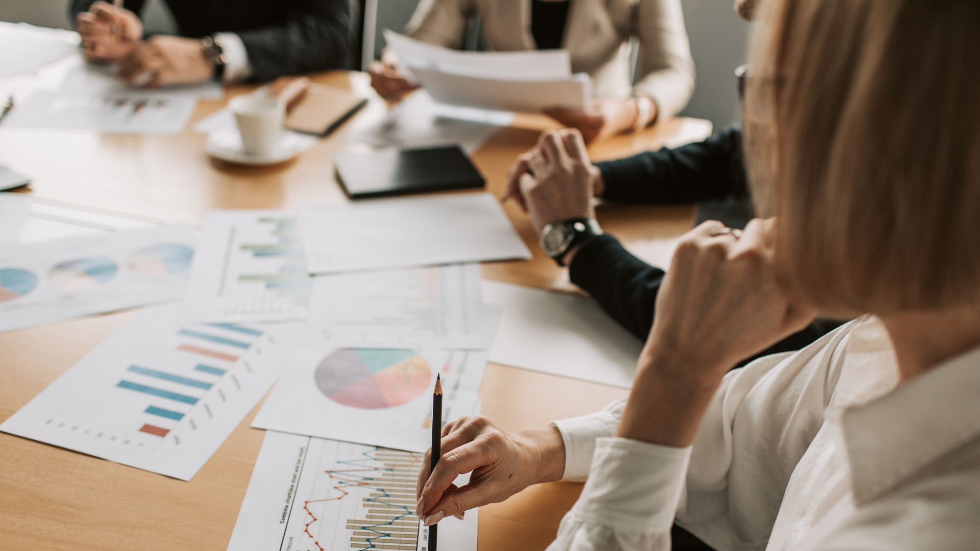 green and white throw pillows on green sofa
