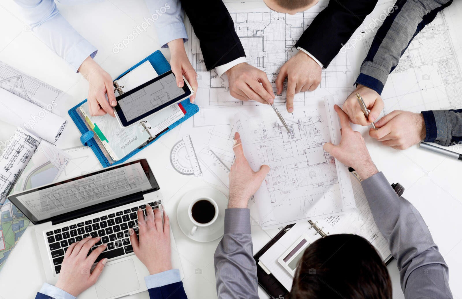 green and white throw pillows on green sofa