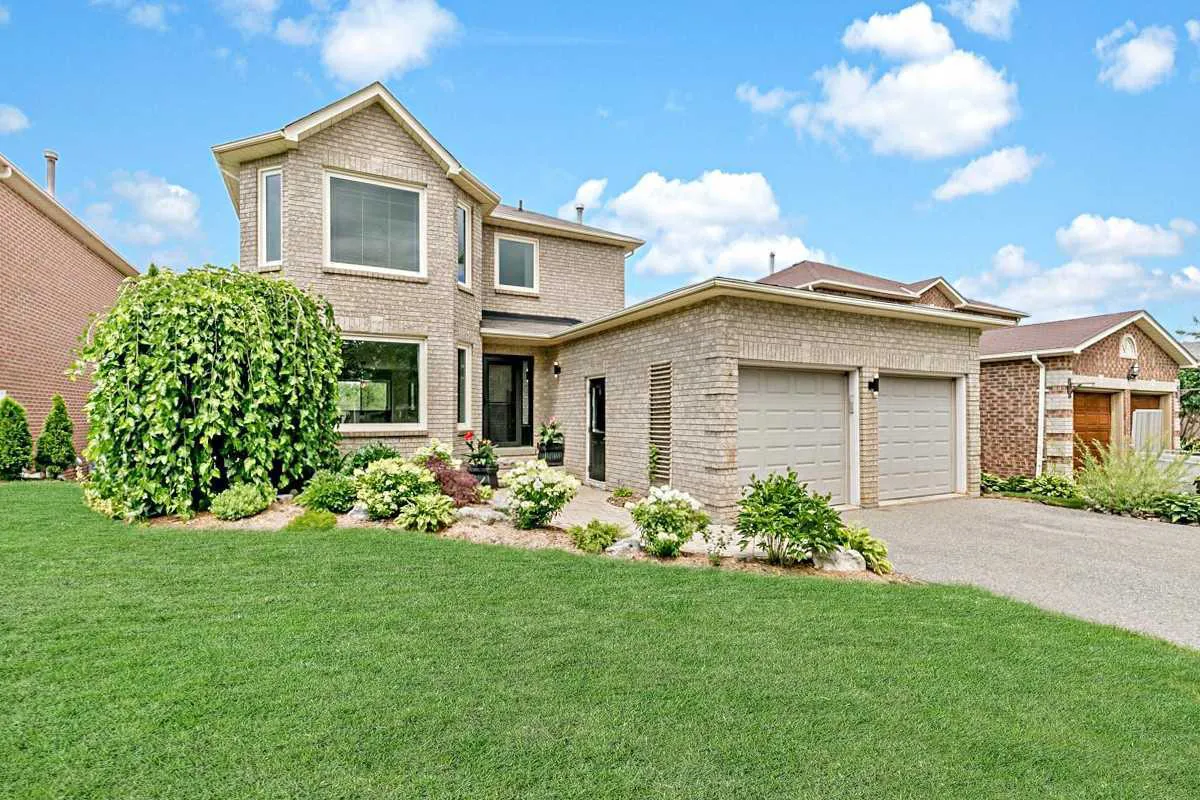 Two-storey all-brick home with attached two-car garage, in the Lisa Marie Nook neighbourhood of Orangeville