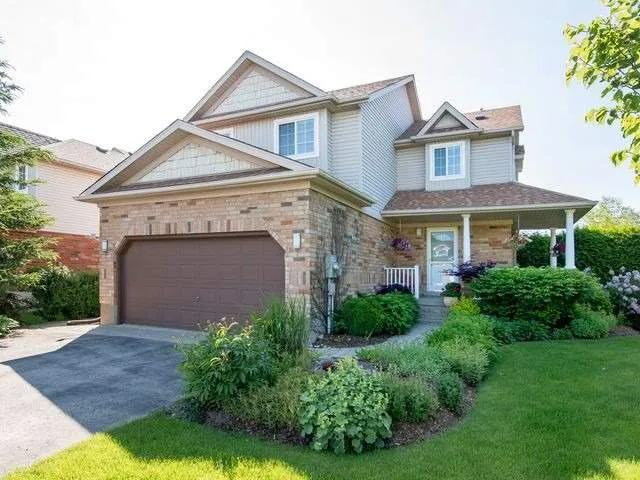 Two storey brick and siding home with attached 2-car garage located in Montgomery Village, Orangeville