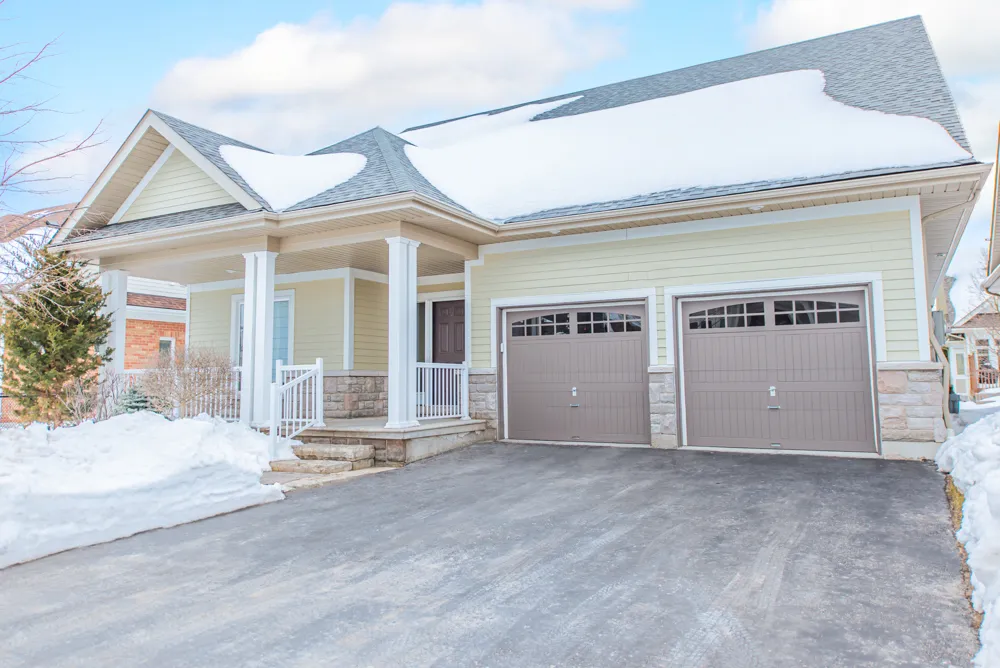 Detached bungalow with attached 2-car garage located in the Watermark Village neighbourhood in Mono