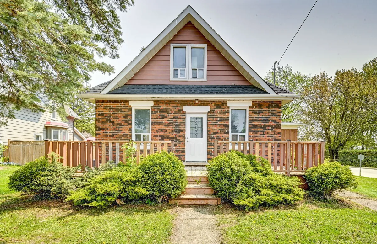 1.5 Storey A-Frame Style Home with wrap around veranda located in Shelburne, Ontario