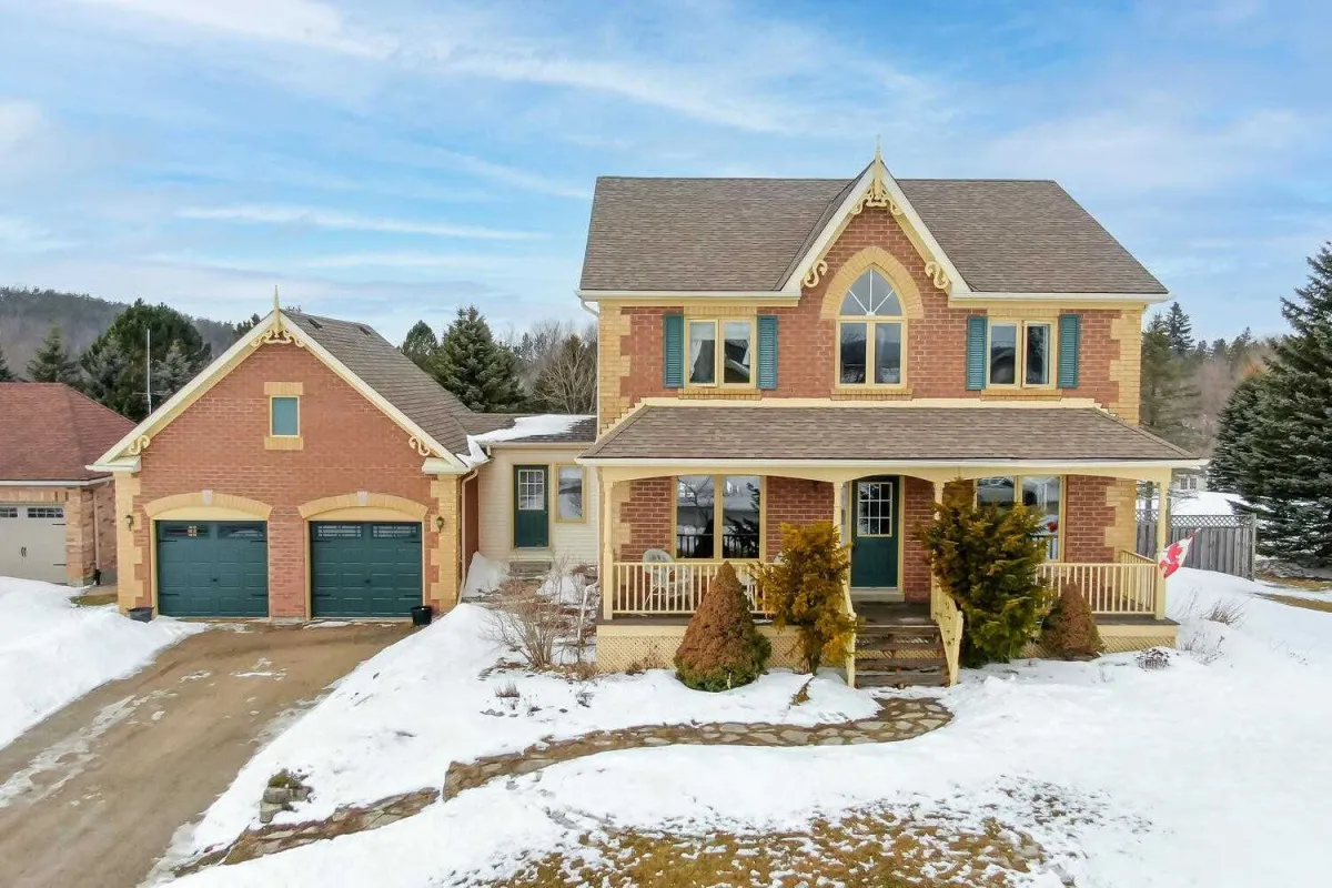 2-Storey Brick Home with Attached 2-Car Garage located in a residential subdivision in Erin, Ontario