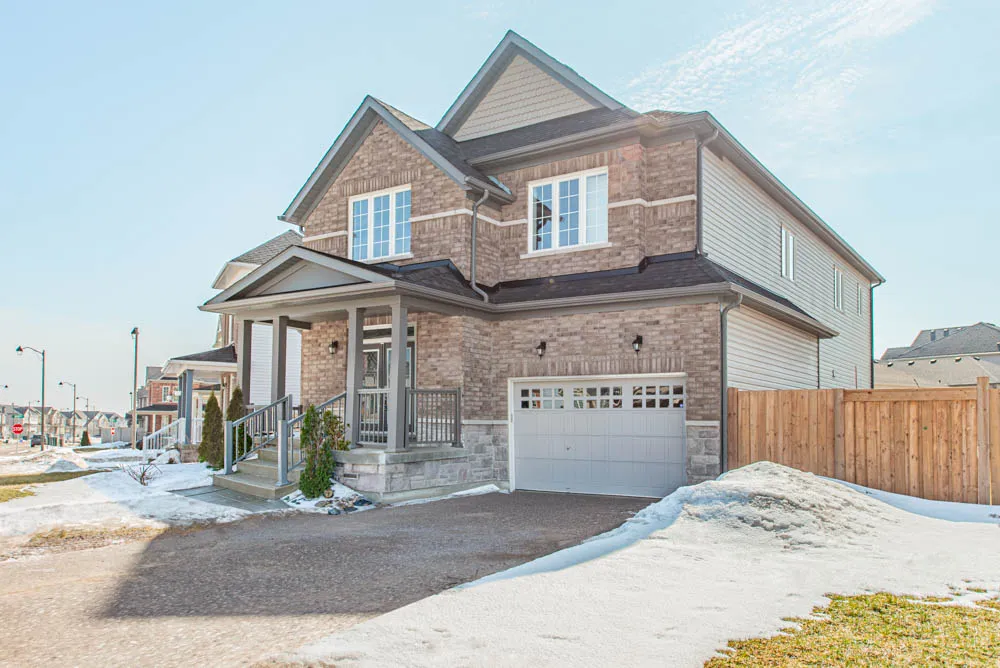 Brick 2-storey detached home with attached 2-car garage located in the Summerhill area of Shelburne