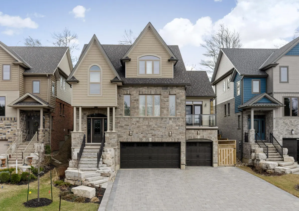 Large newer-build multi-storey home with built-in 3 car garage located in Caledon East