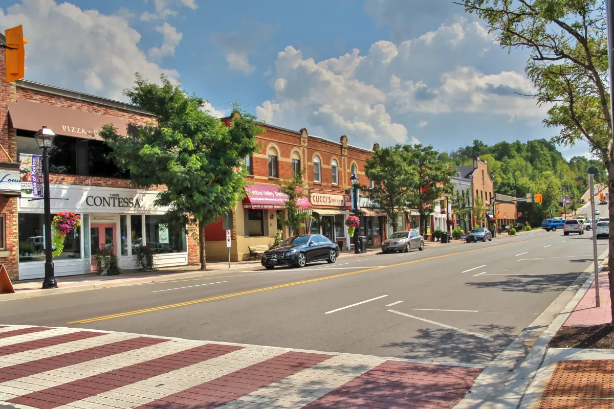 Image of the street lined with shops and trees in the downtown area of Bolton, Ontario