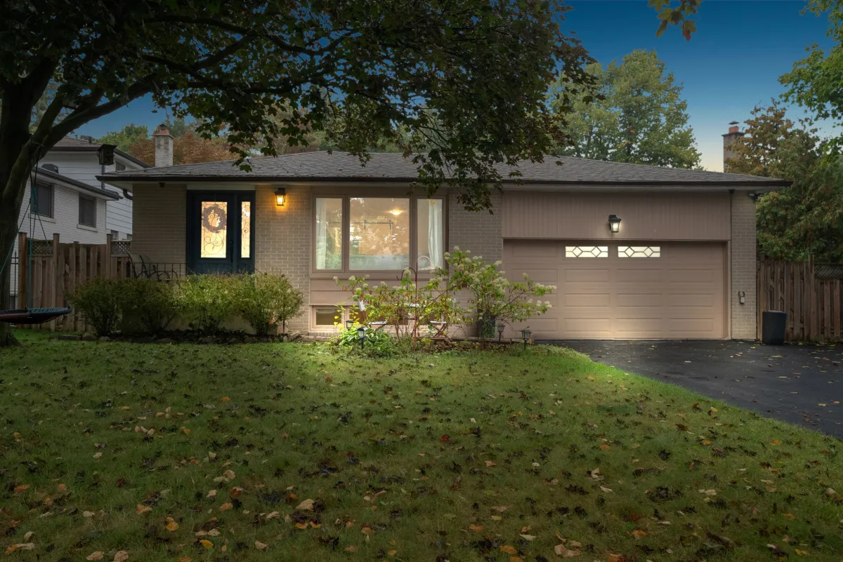 Brick back-split home with attached 2-car garage located in Bolton