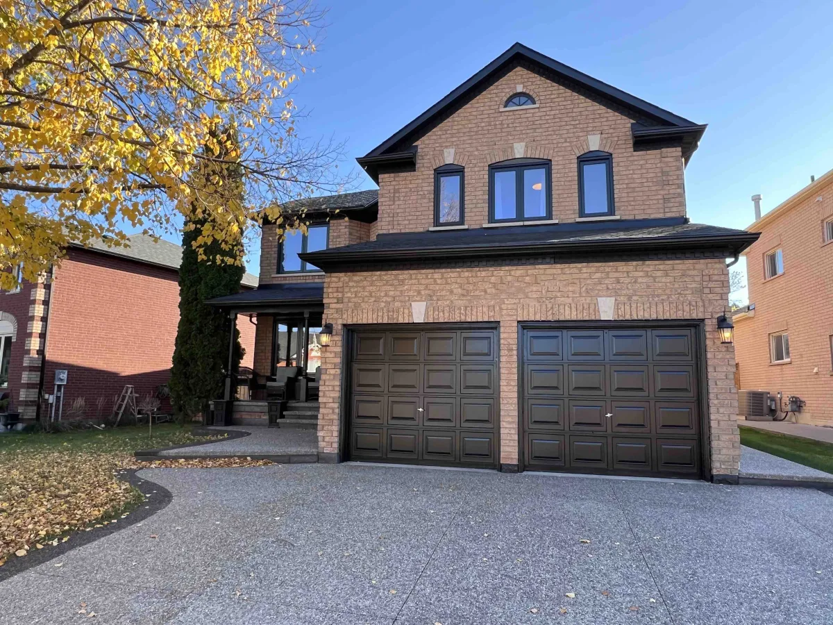 Brown brick detached 2-storey home with attached 2-car garage located in Mayfield West, Ontario