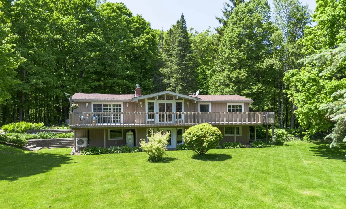 Large raised bungalow with walk-out basement and spacious property located in Mono Mills, Ontario