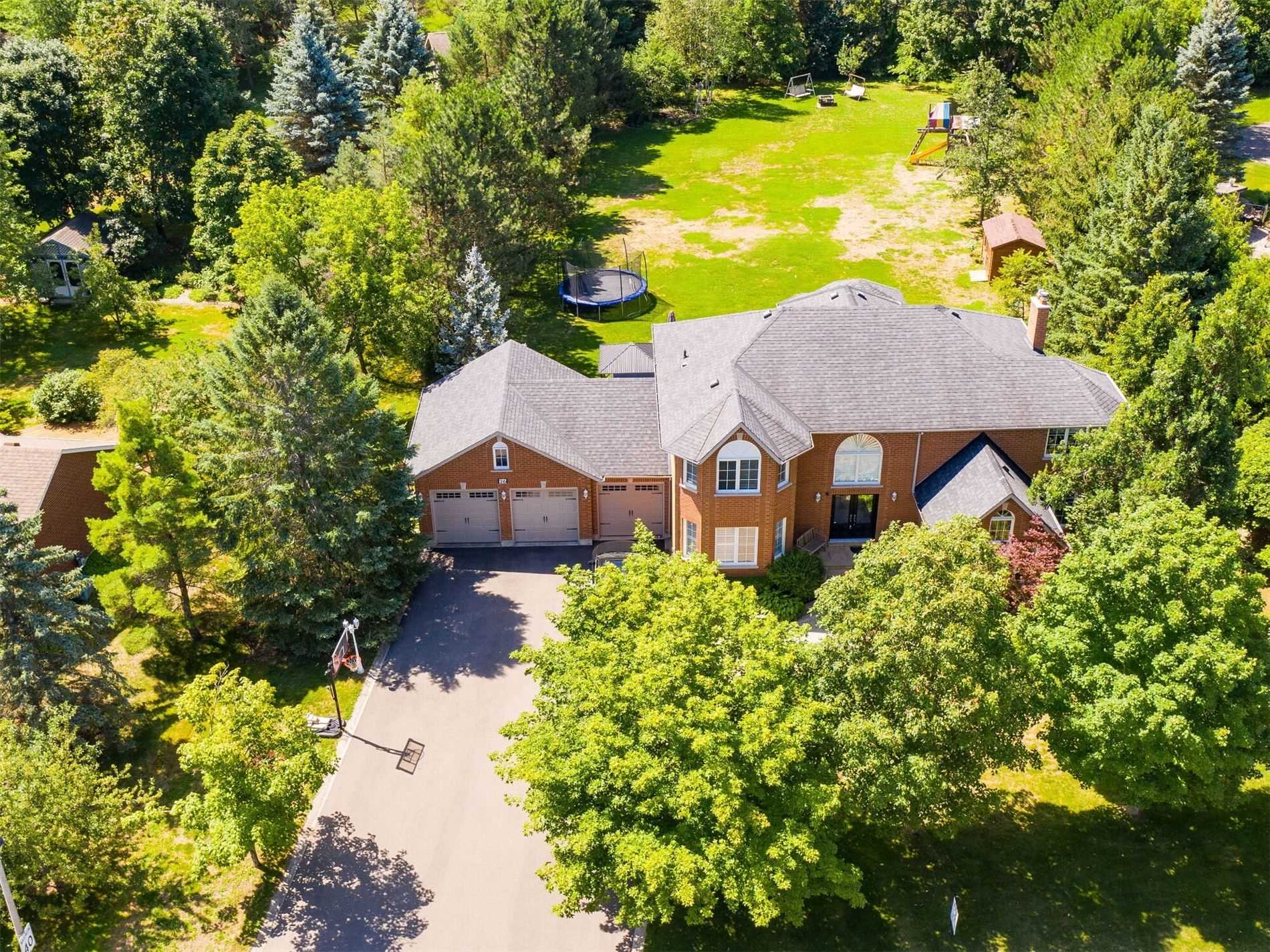Large estate style home on spacious property located within the Caledon East Public School Area of Caledon East