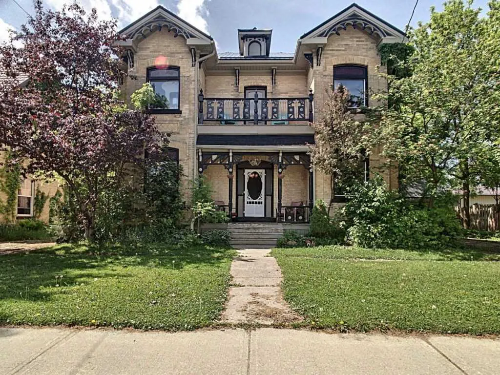 All brick 2-storey century home located in Mount Forest, Ontario