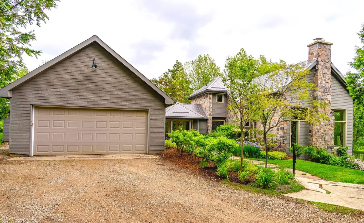 Spacious country home with attached 2 car garage sold in the Ruskview area of Mulmur Township