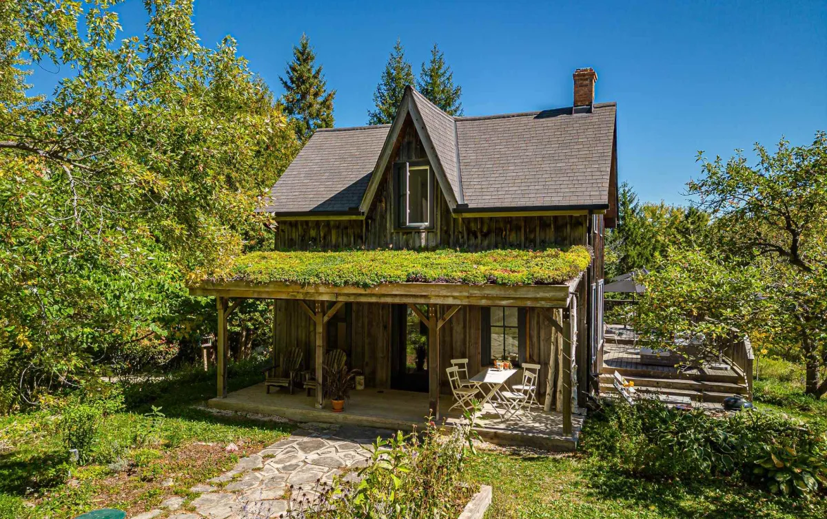 Rustic Country Home surrounded by greenery located in the Ruskview area of Mulmur Township