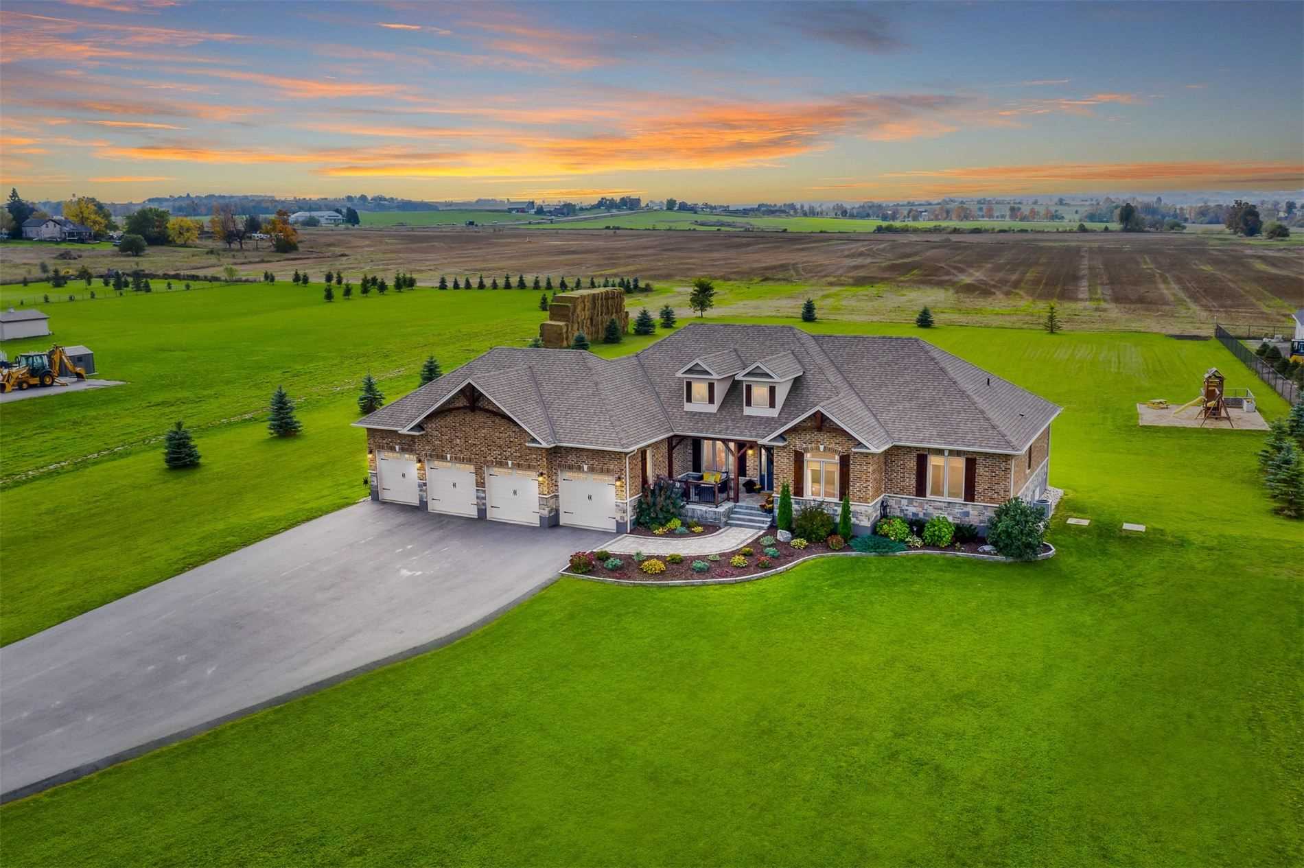 Large estate home with attached 4-car garage and spacious property located in the Rosemont area of Mulmur Township