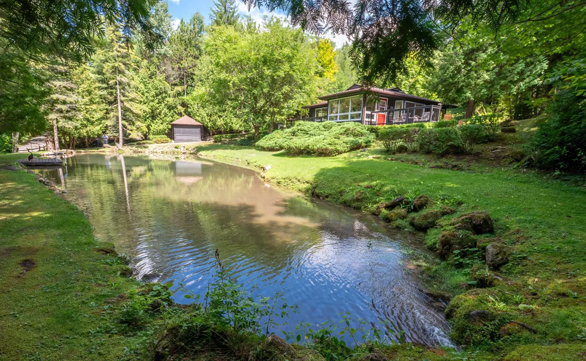 Country home located on a small pond in the Kilgore area of Mulmur Township