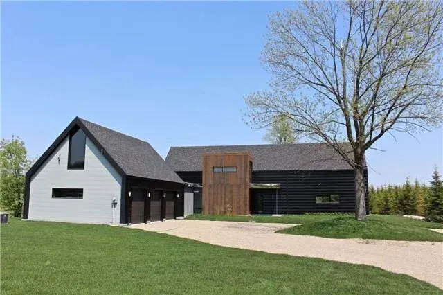 Large modern home with attached 3-car garage located in the Terra Nova area of Mulmur Township