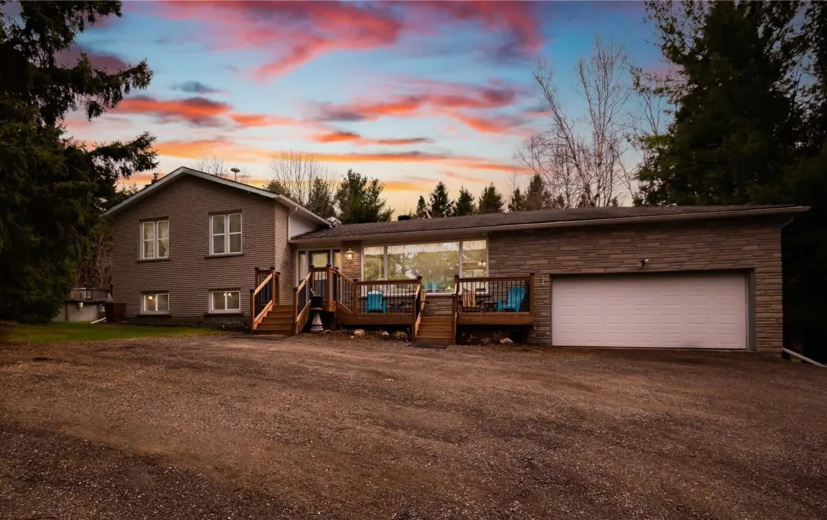 Sidesplit home with attached 2-car garage located in the Primrose area of Mulmur Township