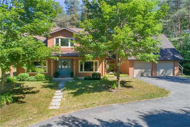 Picture of 2 storey home with attached 2 car garage located in the Airlie area of Mulmur Township