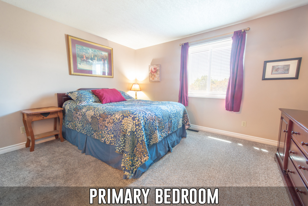 Primary bedroom of the bungalow located at 153 Oneida Place in Kitchener