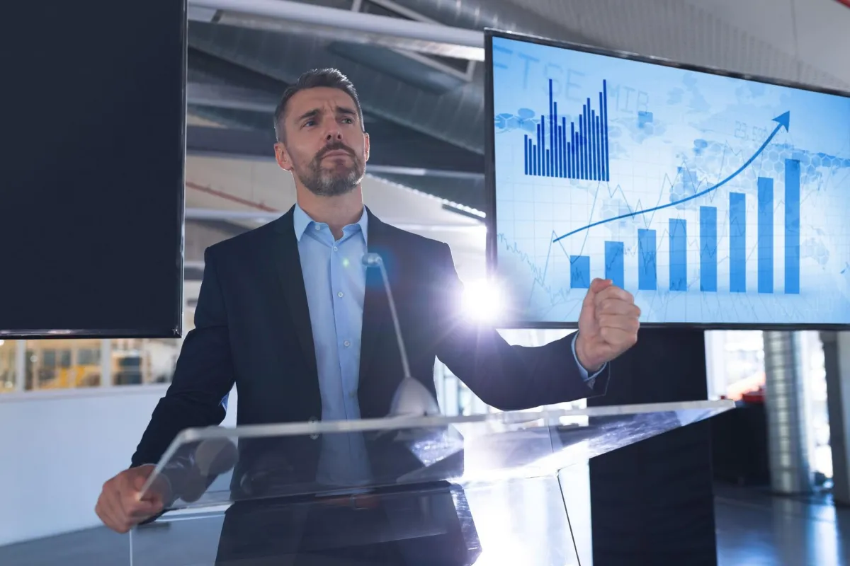 Business professional giving a presentation on Sales