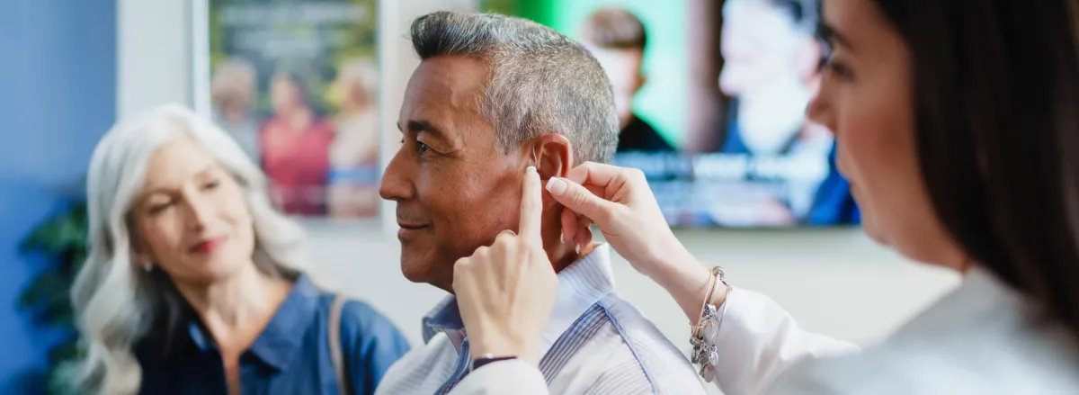 white and silver headphones