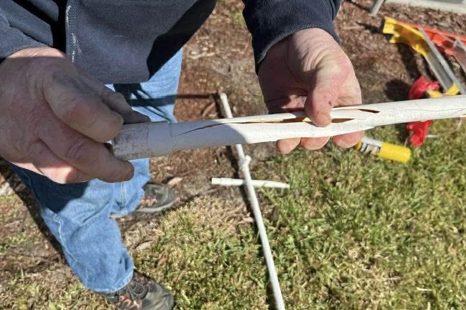 port orange fl Plumber holding broken pipe