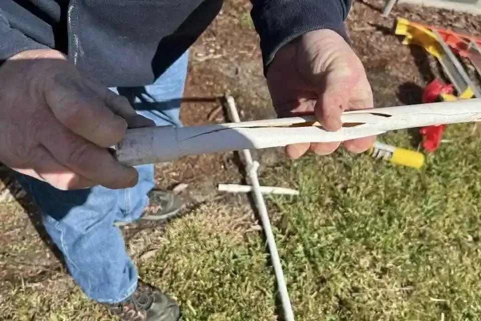 port orange fl Plumber holding broken pipe