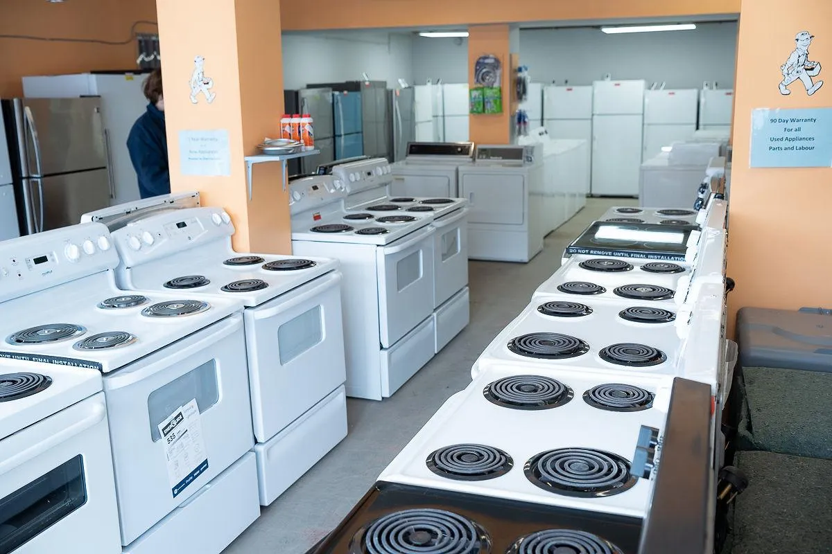 Inspected used stoves and fridges ready for rental units at Al's Appliance