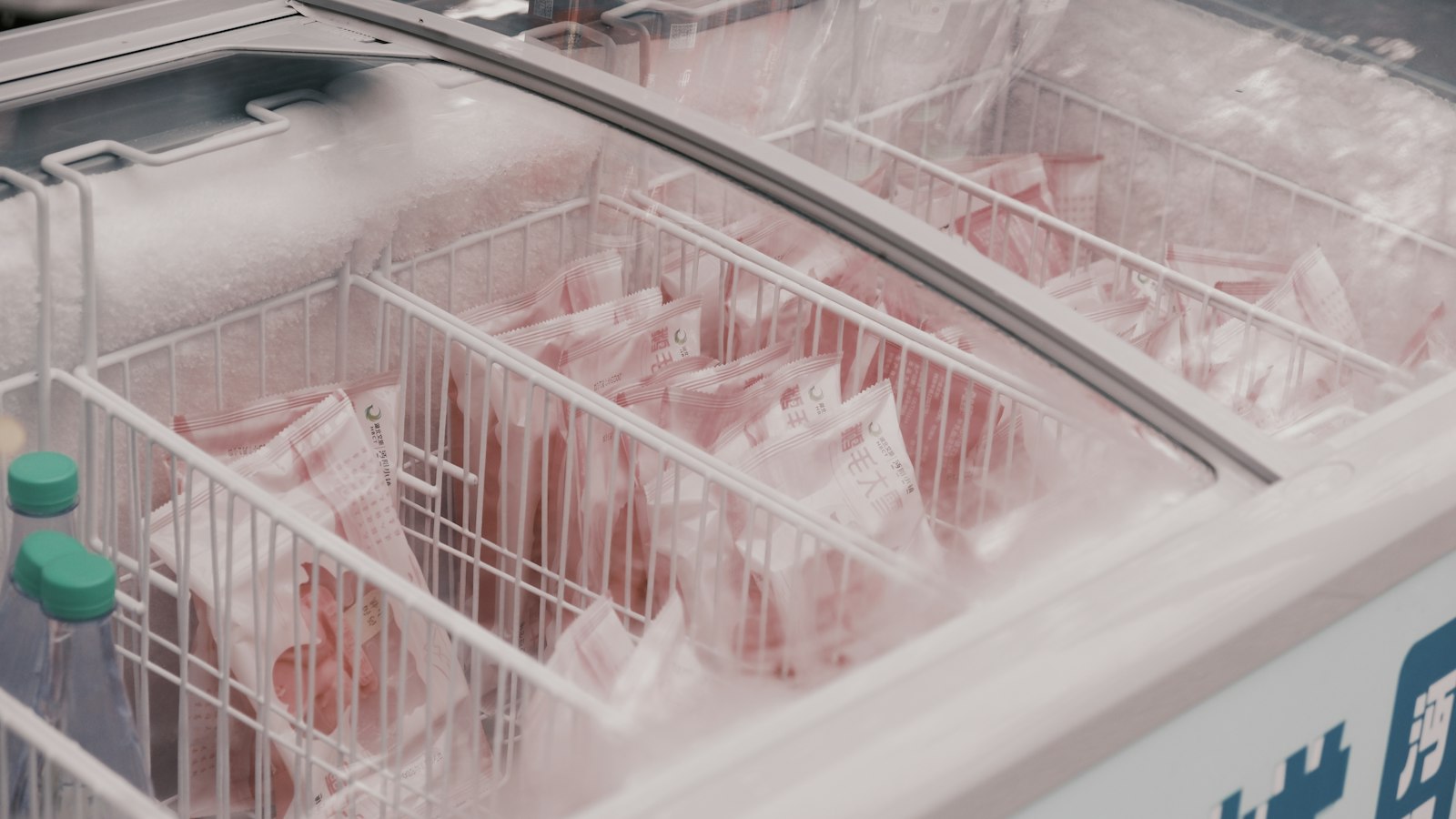 Chest freezer filled with packaged frozen meat