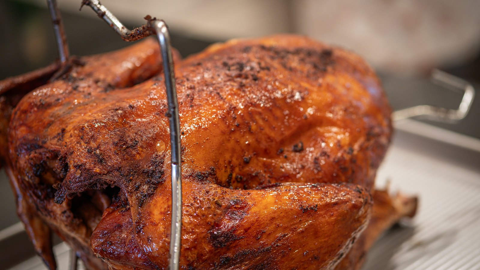 Golden roast turkey on a roasting rack